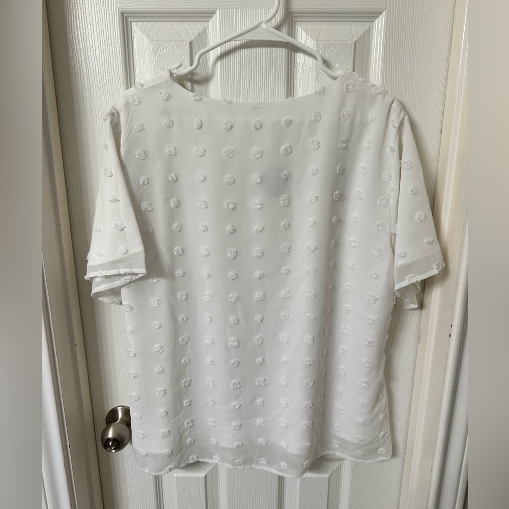 White polka dot top